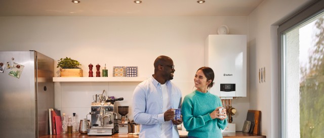 A couple in a kitchen with the ecotec plus