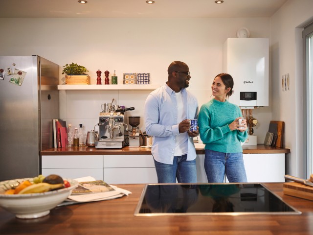 A couple in a kitchen with the ecotec plus