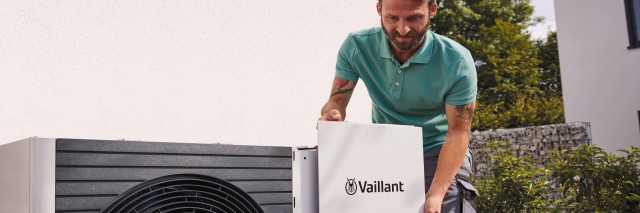 man installing an aroTHERM plus heat pump